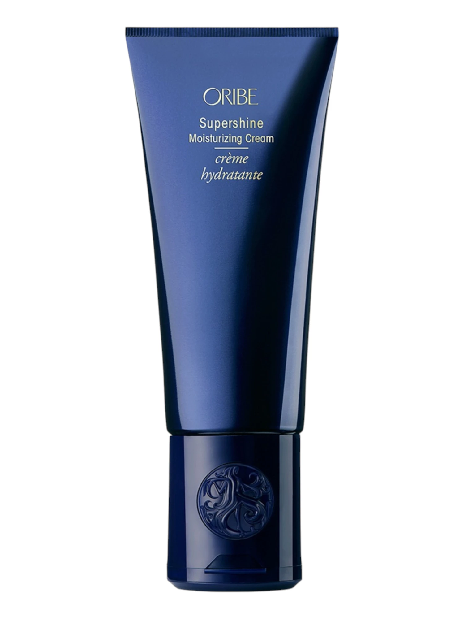 Envase azul vertical de Oribe Supershine Moisturizing Cream de Oribe con tipografía dorada.