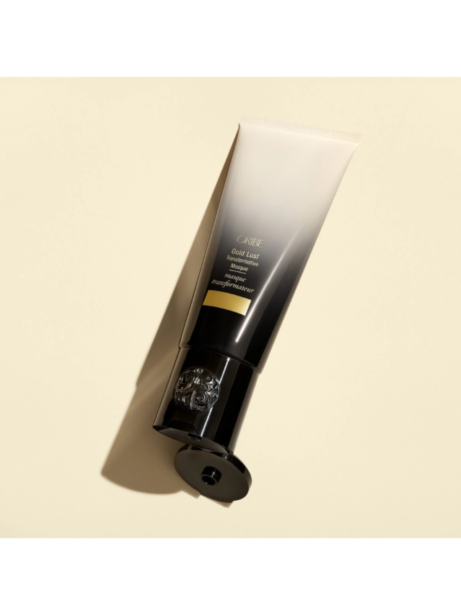 Envase de Oribe Gold Lust Transformative Masque mostrando su diseño premium