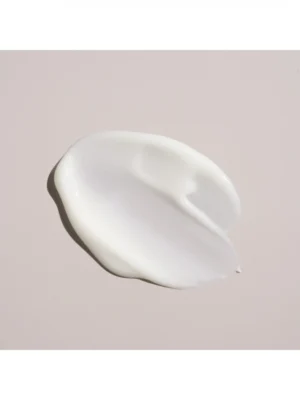 Muestra de la textura en crema fluida y ligera del acondicionador voluminizador de Oribe