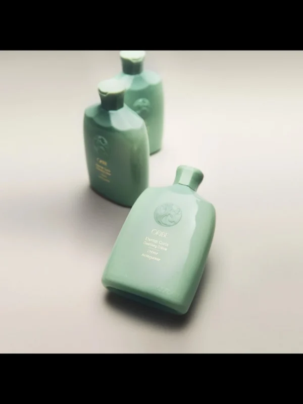 detalle botellas Oribe Eternal Curls Cleansing Crème crema limpiadora hidratante para cabello rizado