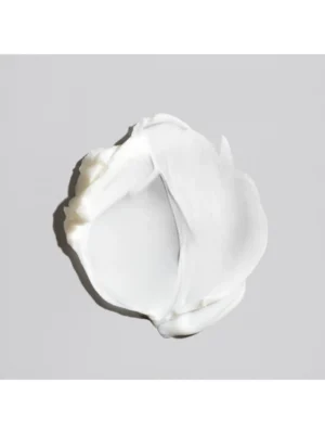 Detalle de la textura con fibras elásticas de Oribe Fiber Groom Elastic Texture Paste