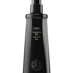 Envase frontal de Oribe Foundation Mist de 200 ml, spray preparador de peinado y protector térmico