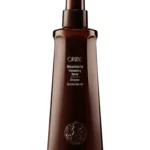 Envase frontal de Oribe Maximista Thickening Spray de 200 ml, spray voluminizador con protección térmica