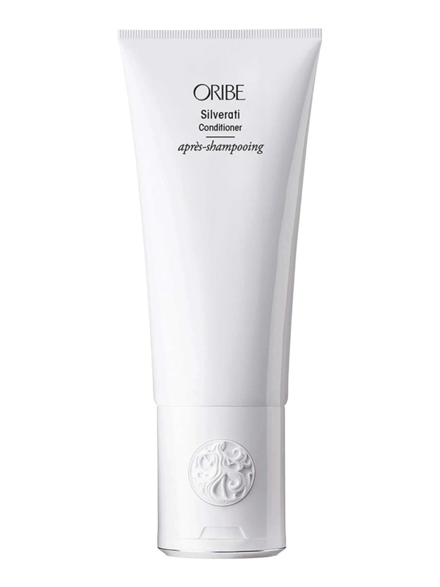 Tubo vertical de Oribe Silverati Conditioner en color blanco con el emblema circular en la base y letras negras sobre fondo blanco.