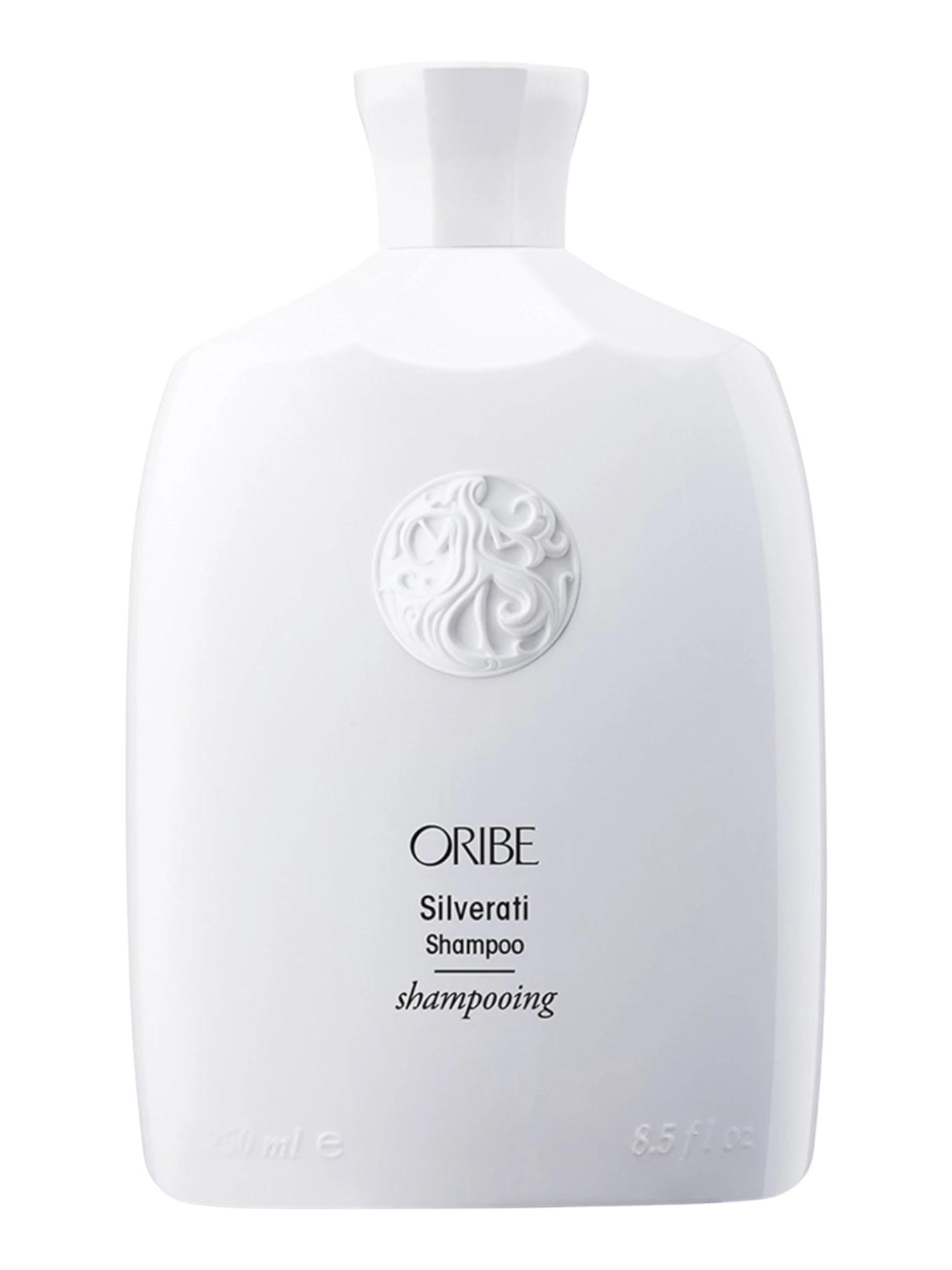 Botella frontal de Oribe Silverati Shampoo de 250 ml en color blanco puro con el emblema circular en relieve y tipografía minimalista negra.
