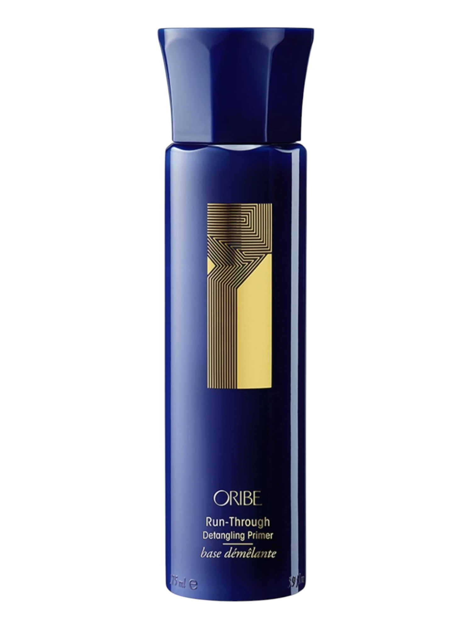 Envase vertical de Oribe Run-Through Detangling Primer con diseño minimalista y detalles dorados.