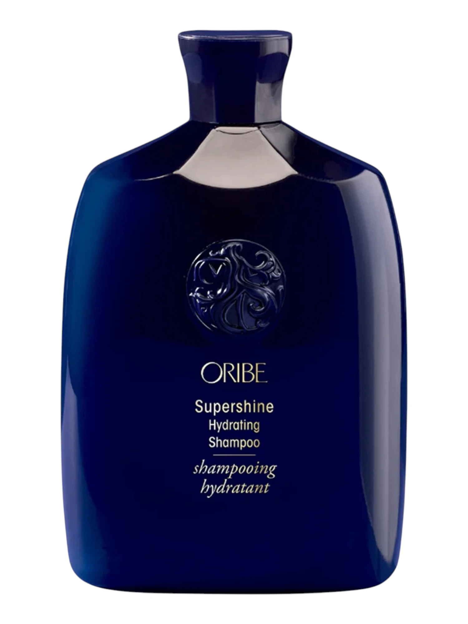 Frasco azul de Supershine Hydrating Shampoo de Oribe con detalles dorados.
