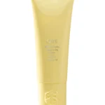 Mascarilla fortalecedora Hair Alchemy de Oribe en envase original sobre fondo claro