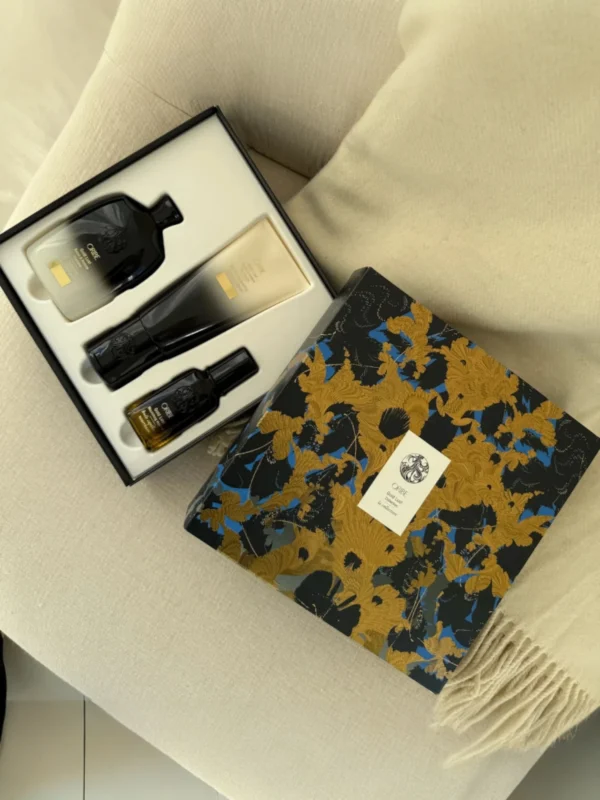 Cofre Oribe Gold Lust Ritual Set con champú, acondicionador y aceite capilar