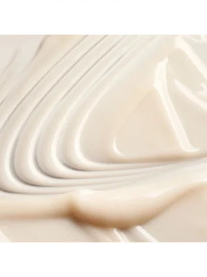 Textura cremosa del acondicionador Oribe Serene Scalp Densifying Conditioner densificante