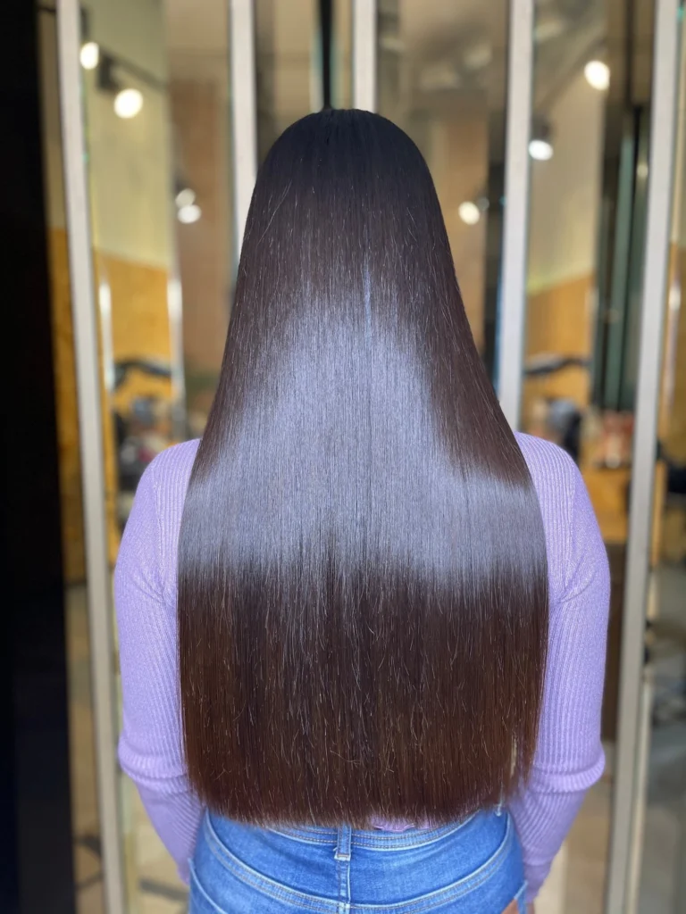Resultado del tratamiento Keratin Infusion con alisado y brillo intenso en cabello largo realizado en Salón Rafael Dueñas