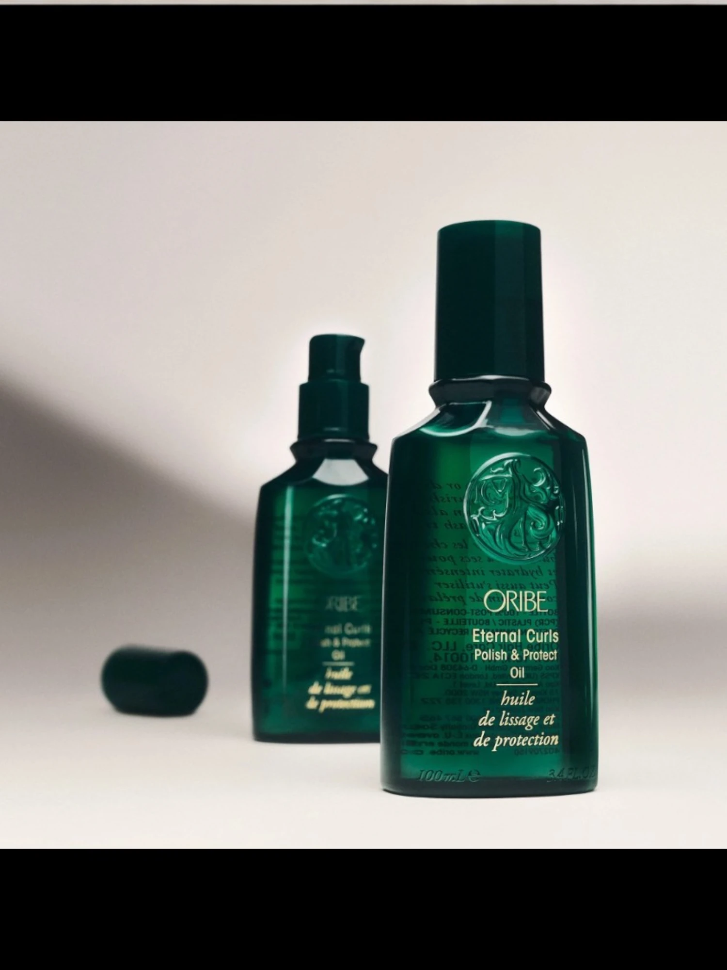 Oribe Eternal Curls Polish & Protect Oil botella verde detalle producto aceite capilar profesional