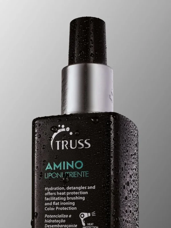 Detalle del spray Truss Amino mostrando hidratación y protección térmica sin apelmazar